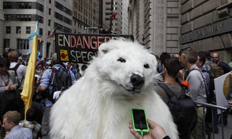 An activist dressed as a polar bear at a rally in New York