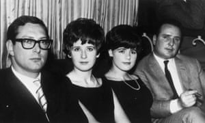 circa 1963:  English criminal Bruce Reynolds (left), a member of the gang which robbed a mail train of over two million pounds at Cheddington, Buckinghamshire, with (from left) his wife, Frances, Barbara Daly and John Daly.