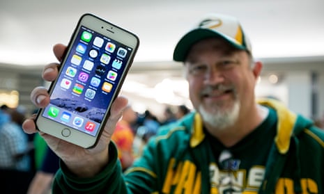 An iPhone 6 buyer shows off his new purchase