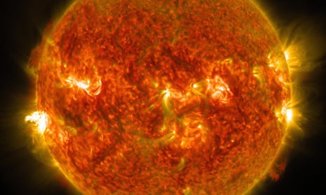 The sun emitting a mid-level solar flare