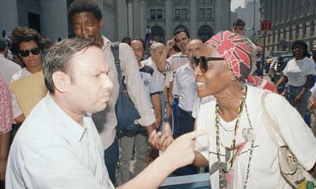 Opposing factions in the Yonkers housing battle air their views outside the New York federal court building in 1988.