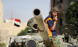 A soldier loyal to Syria's president, Bashar al-Assad