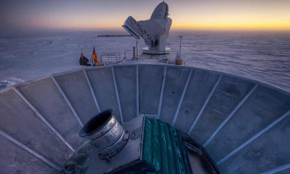 The Bicep2 telescope, foreground, and the South Pole telescope in Antarctica