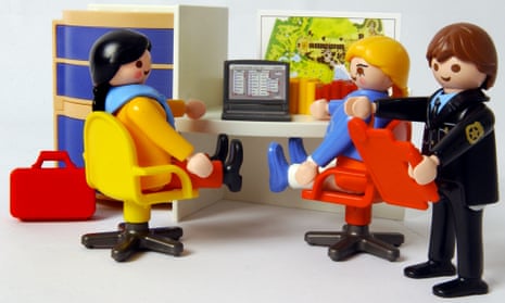 Toy figures of office workers