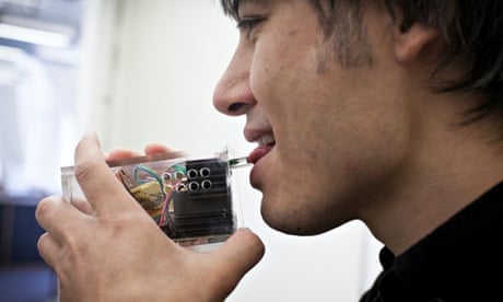 Adrian Cheok with one of his devices