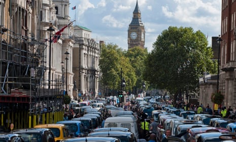 Taxi drivers block Whitehall during a demonstration in London, Britain, 24 September 2014. Taxi drivers participated in a protest against laws they say affect the safety of Londoners including competitors such as that allow mobile applications such as Uber.