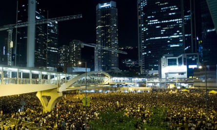 Protestors gather in Admiralty district alongside students during a protest outside the headquarters of the legislative council in Hong Kong.