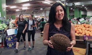 Monica Tan holding a monster durian.