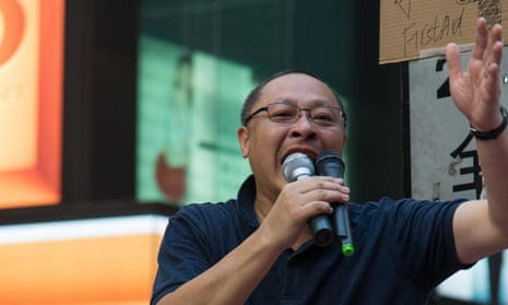 Benny Tai, one of the leaders of Occupy Central, speaks to a crowd of protesters in Causeway Bay.