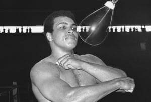 The initial attraction to this shot is, of course, the quirk of the punchbag. It appears semi-transparent because the photographer has used flash to trap the action in the foreground, while the duration of the overall exposure has rendered the background visible as well. The beautiful silhouettes in the distance behind Ali are critical, too.