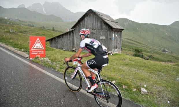 Haute Route Dolomites - whatever the weather, the 1km sign to the top of a col is always welcome.