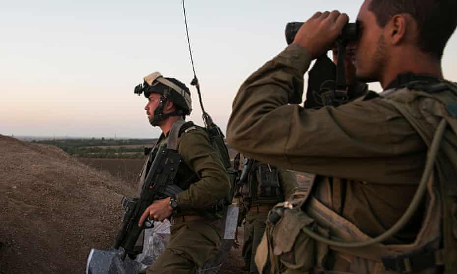 Israeli soldiers at an observation post overlooking the Gaza Strip last month