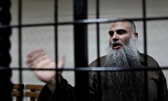 Islamist cleric Abu Qatada speaks to the media after a hearing in Amman, Jordan
