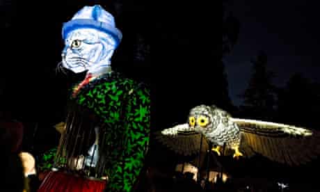 Performance artists during the illuminated procession at Festival No 6