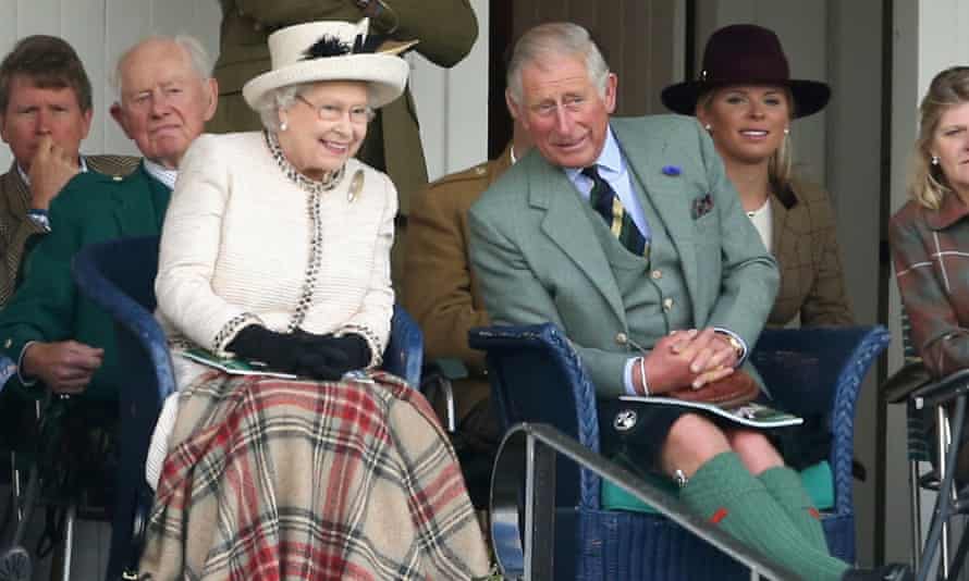 The Queen and the Prince of Wales watching the action during the Braemar Highland Games.