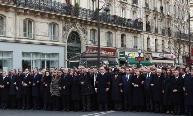 The world leaders gather at the head of the march.