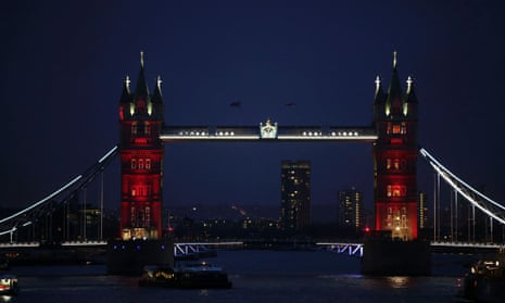 Tower Bridge is seen lit in the colours of the French national flag in a tribute to the victims of the Paris terror attacks