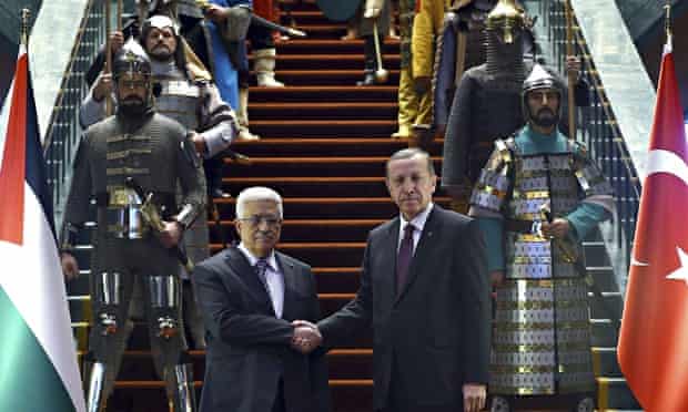 Recep Tayyip Erdoğan, right, shakes hands with his Palestinian counterpart Mahmoud Abbas