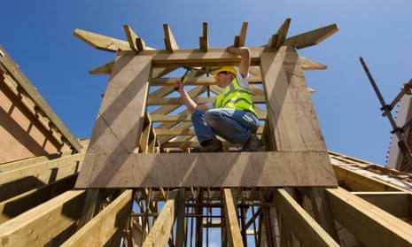 Construction worker building a house