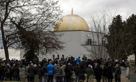 The funeral of Ahmed Merabet at a Muslim cemetery in Bobigny.