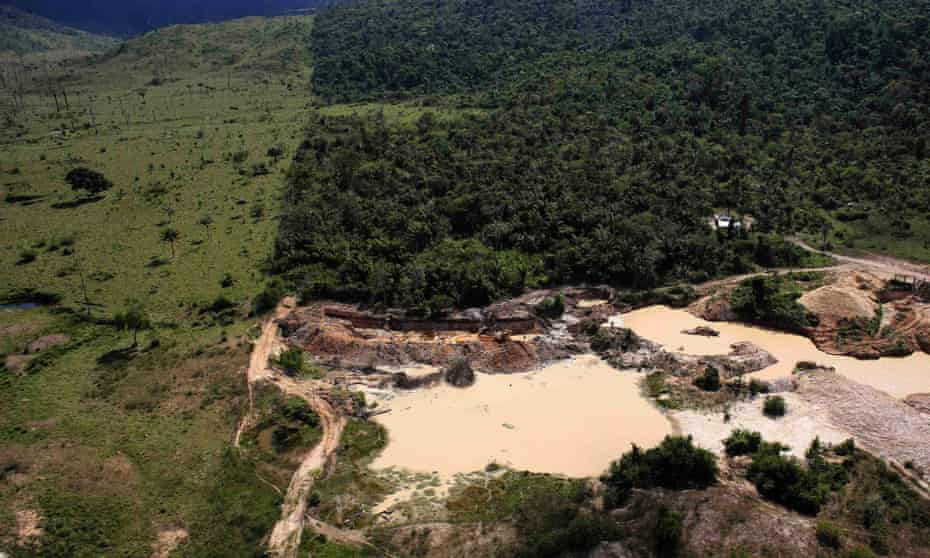 An illegal gold mine, located on an area of deforested Amazon rainforest, is seen near the city of Castelo dos Sonhos, Para State, Brazil