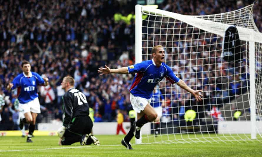 Peter Lovenkrands scores against Celtic in the 2002 Cup Final.