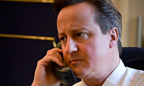 David Cameron talking on the telephone to US president, Barack Obama