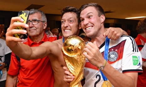 Mesut Ozil takes a selfie after the World Cup final