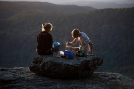 A couple cooking a camping dinner, Ozark Highlands Trail. Arkansas