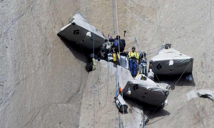 Tommy Caldwell, center, with a photographer at a base camp while climbing the Dawn Wall.