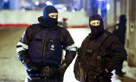 Riot police block the Rue de la Colline in Verviers, Belgium, during an anti-terrorist operation.