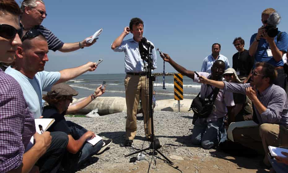 Tony Hayward, BP chief executive, is surrounded by journalists asking questions about the 2010 spill