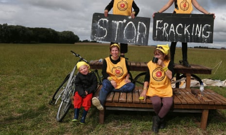 Ami and Nicci (back left to right) and Joshua, Becky and Julie a group of anti-fracking protesters who are setting up camp near Little Plumpton, August 21, 2014. Energy firm Cuadrilla said it, alongside local farmers, has served a claim for possession against demonstrators who have occupied farmland near Blackpool.