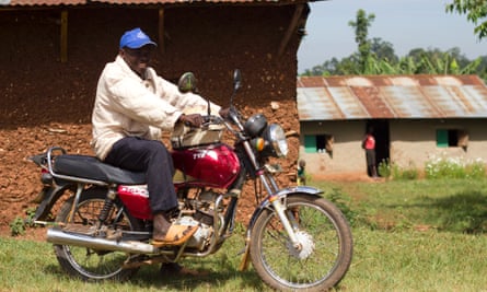 Elam Kangaya, 43, was able to buy a motorcycle with the profits from his farm