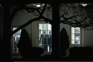 Barack Obama and David Cameron leave the Oval Office for a working dinner elsewhere in the White House. They struck different notes on surveillance powers after the president said that it was important to have a balance between monitoring terror suspects and protecting civil liberties.