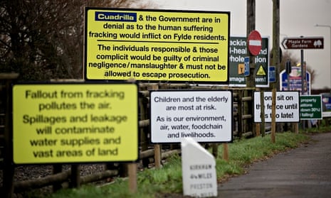 Anti-fracking signs line the road next to a proposed shale gas site in Lancashire.