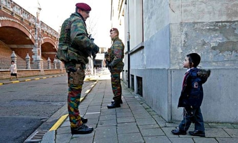 Belgian paratroopers guard outside a Jewish school in Antwerp