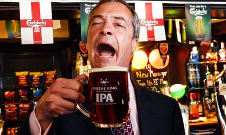 Nigel Farage celebrates with a pint in  2014.