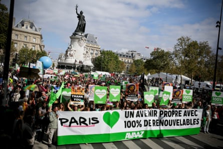 The crowd walks at People's Climate March Paris, on Sunday, September 21, 2014 in Paris France.An estimated 25,000 people took part in the march, which was part of the largest global climate mobilisation in history with 580,000 people participating in 2646 events in 156 countries.