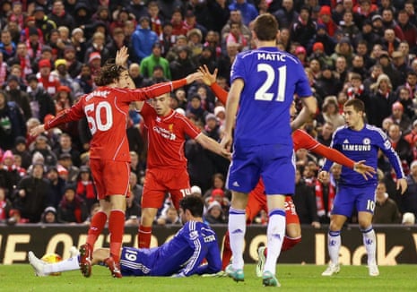 Jordan Henderson and Lazar Markovic appeal for a penalty after the ball appears to stike Diego Costa on the arm.