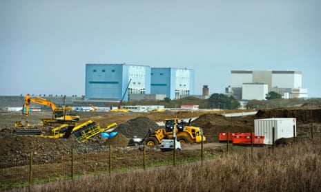 Visit to the Hinkley Point B nuclear power station and the Hinkley Point C construction site in Somerset on 7 Nov 2014.  Earthworks in preparation for the construction of EDF Energy's Hinkley Point C nuclear power station (twin reactors of Hinkley A in the background, and Hinkley B, right).