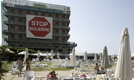 A massive billboard reading 'Stop Solidere', in reference to the construction giant owned by the family of slain former Lebanese premier Rafiq Hariri, hangs at the Saint Georges Hotel and Yacht Club in Beirut. Once a symbol of Beirut's golden age, the St Georges hotel today is but a hollow shell at the centre of an epic real estate battle pitting its owner against powerful developers.