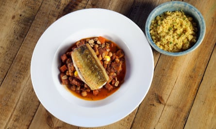 Fillet of gurnard on a bright ratatouille with a dish of cous cous by the side