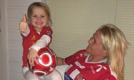 Four-year-old YNWA with her mum. The family plan a trip to Anfield in May.