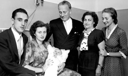 Ernö Erbstein, centre, with wife Jolanda to his right and daughter Susanna far right after the birth of the son of the Torino player Iosif Fabian.