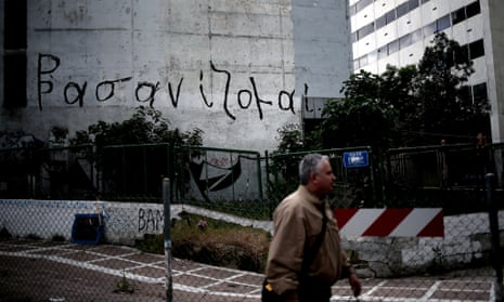 Graffiti that says ‘I am suffering’ on a building in Athens.