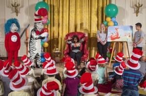 Washington, US First Lady Michelle Obama reads the newly updated edition of Dr. Seuss's Oh, the Things You Can Do That Are Good For You to local students in the East Room of the White House