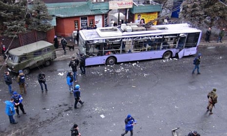 Ukrainian civilians boarding a bus in conflict zone