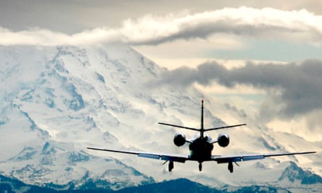 Private jet landing in the Alps