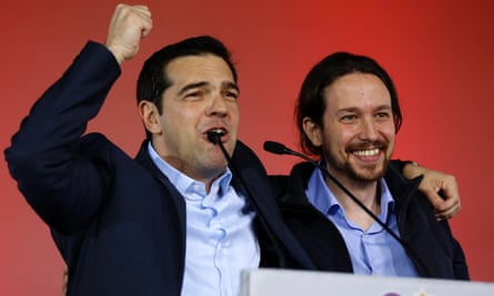 Syriza leader Alexis Tsipras (L) addresses party supporters with Spanish Podemos party chief Pablo Iglesias at the Athens rally.